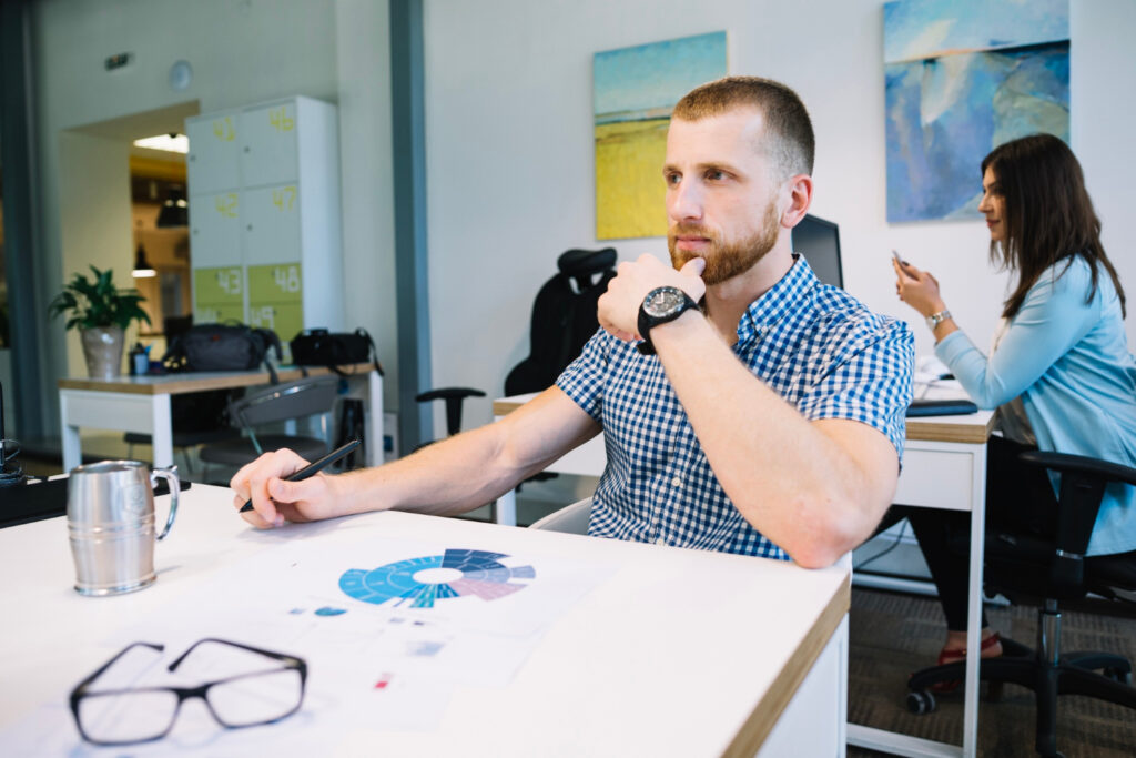 Man thinking in office